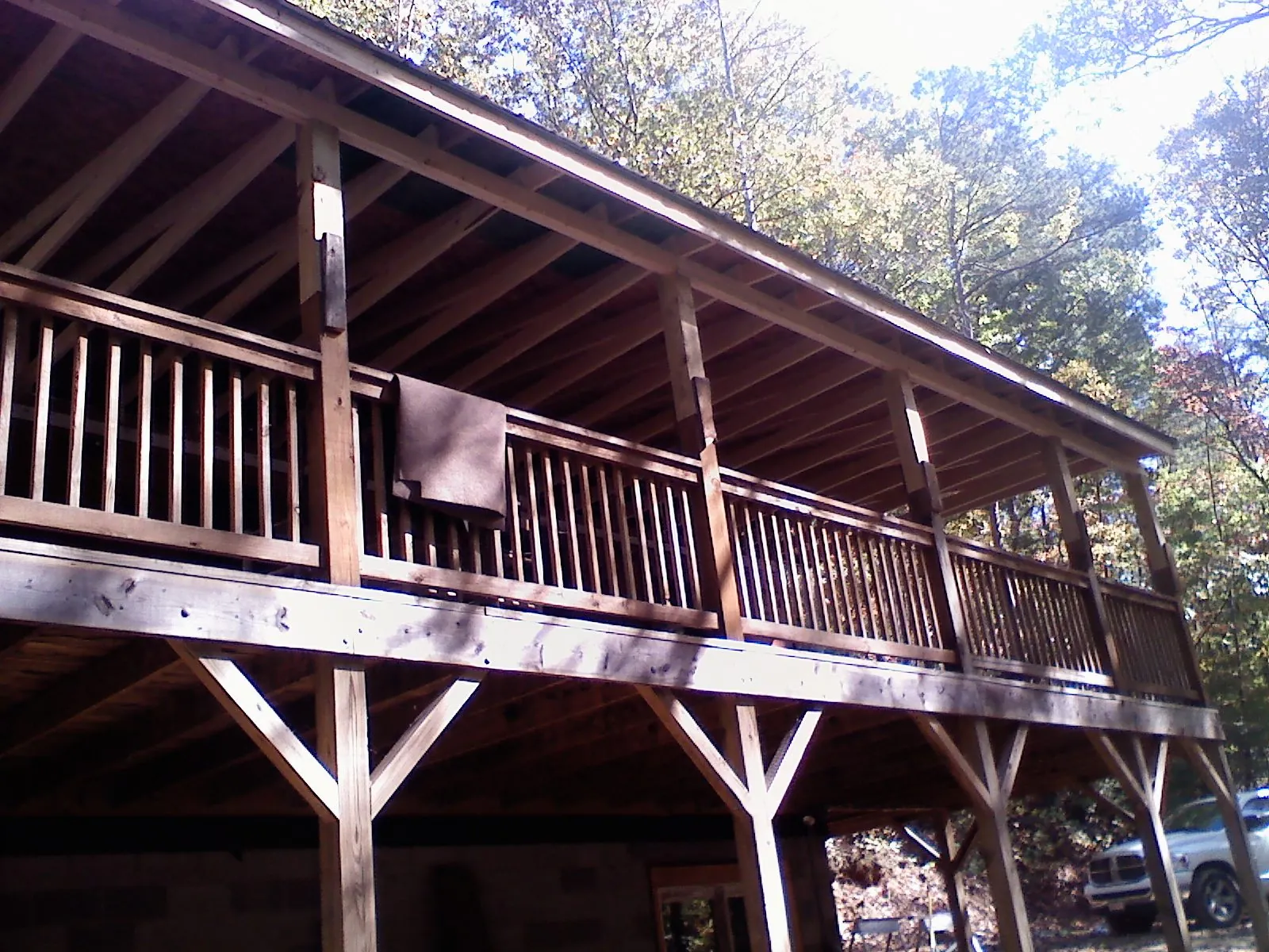 Timber framing under a new elevated porch and deck — Roof Leak Repair in Mc Ewen by Roofing Brothers